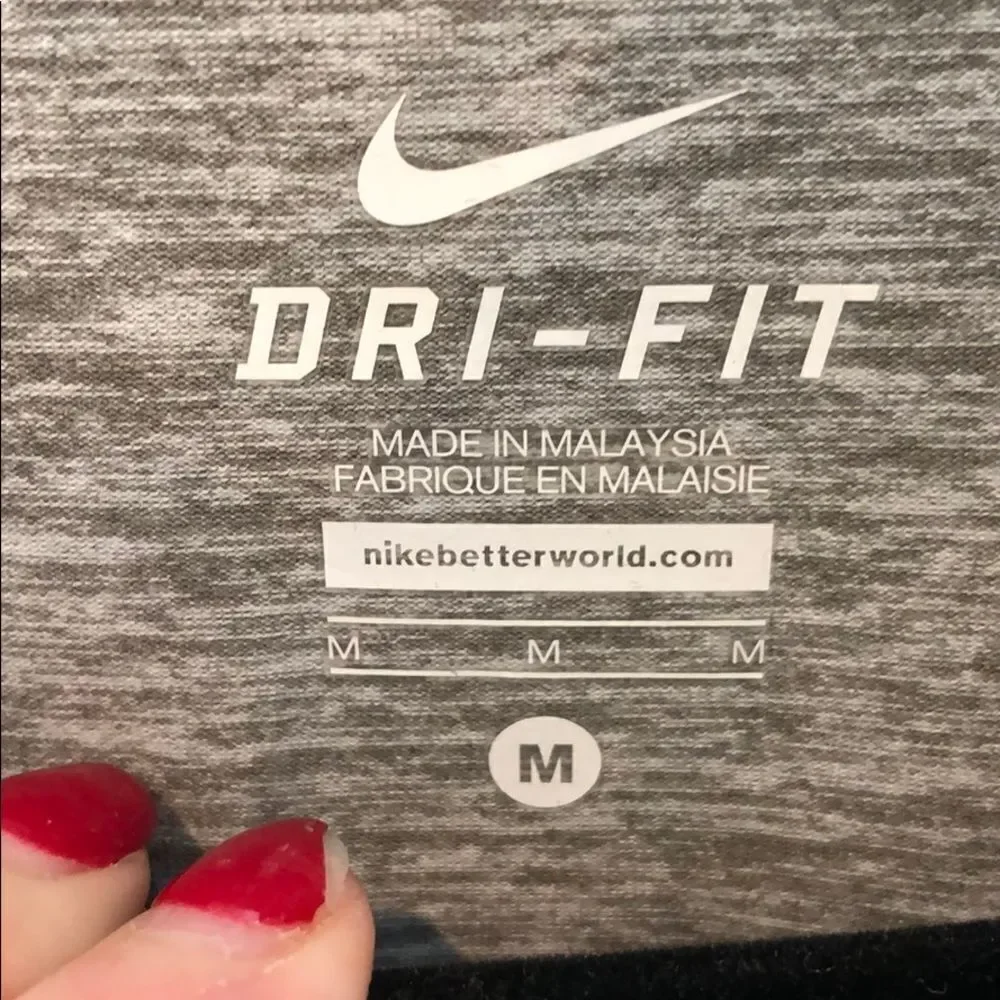 Nike Dri Fit long sleeved 1/4 Zip size med